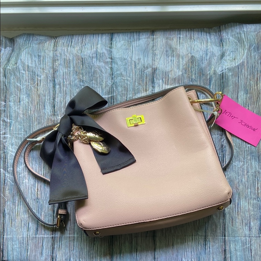 Betsey Johnson Pink Crossbody Bag with Playful Black Bow and Locket Charms